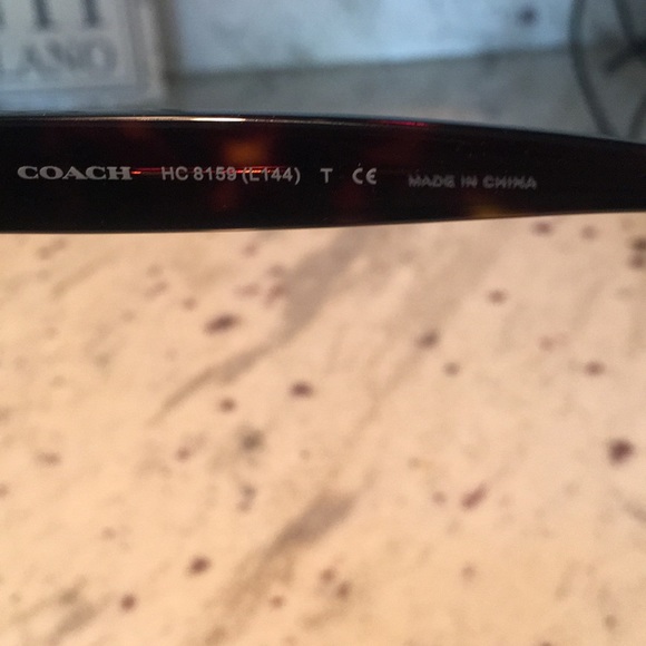 Coach dark tortoise sun glasses